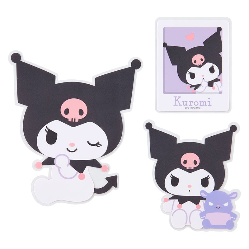 Sanrio sticker set displayed on a notebook with colorful accessories