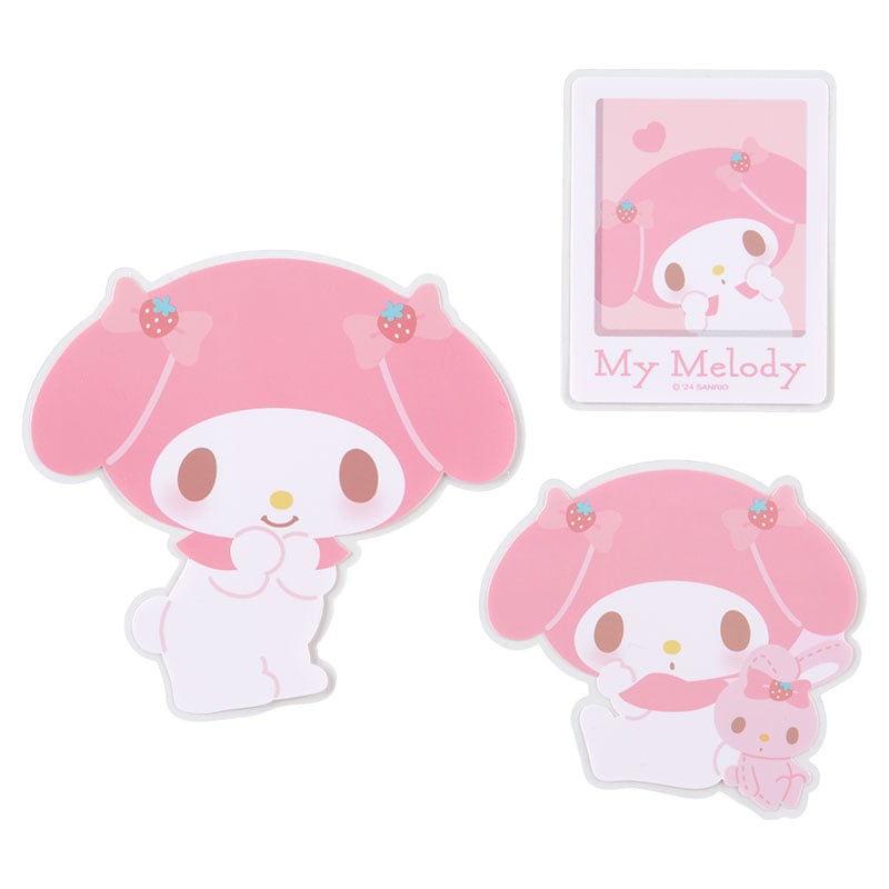 Close-up of My Melody stickers on a laptop, showcasing their vibrant colors.