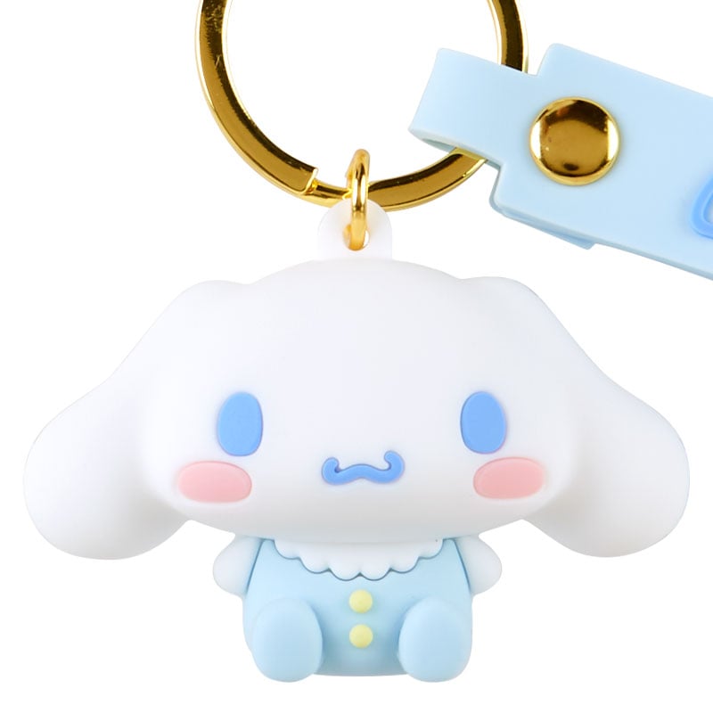 Side view of Sanrio keychain showing embroidered onesie details