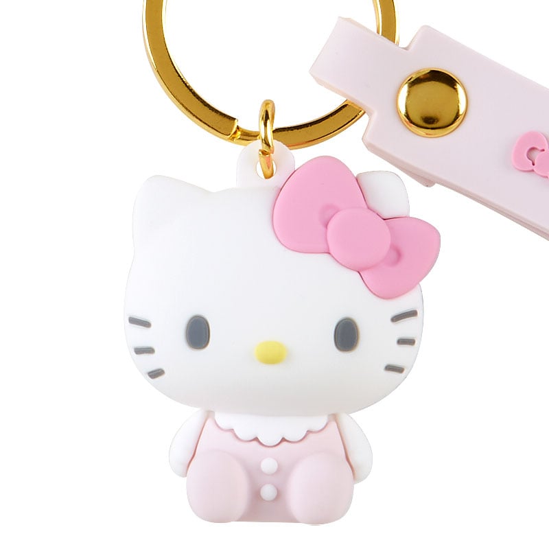 Cute Sanrio keychain featuring Hello Kitty in a onesie