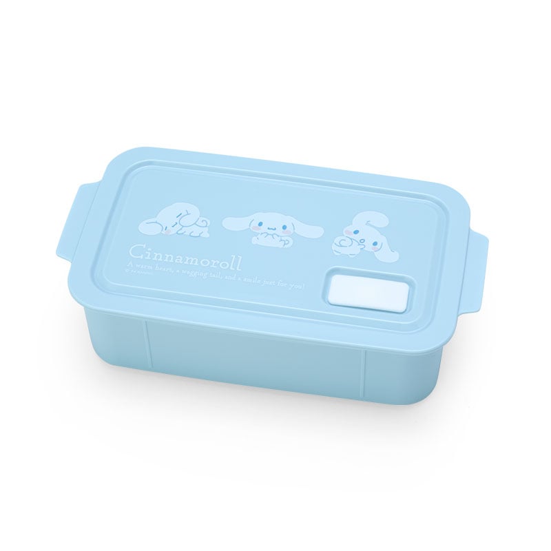 Side view of Cinnamoroll bento box filled with sushi and fruits.