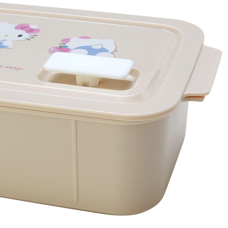Hello Kitty bento box with lid open, showing internal divider