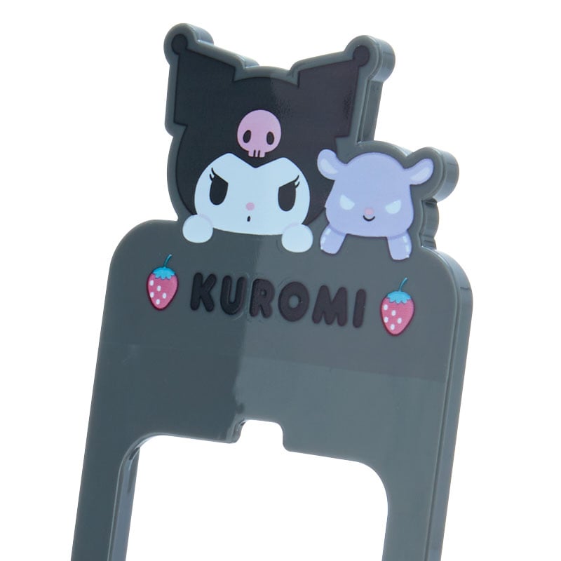 Folded Kuromi phone stand fitting into a bag for travel