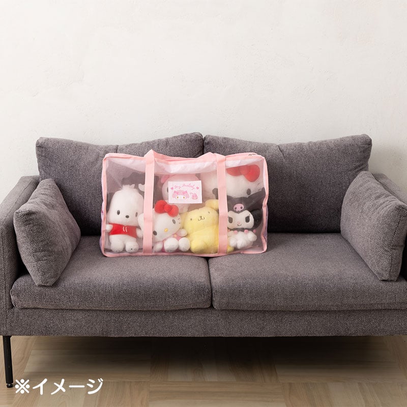 Hello Kitty mesh tote bag with plush toys inside, showcasing its versatility