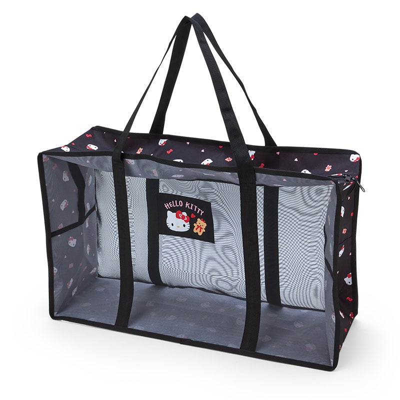 Hello Kitty rolling laundry basket loaded with clothes, wheels visible