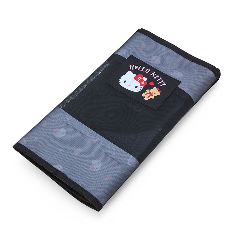 Folded Hello Kitty mesh storage tote, demonstrating its compact design