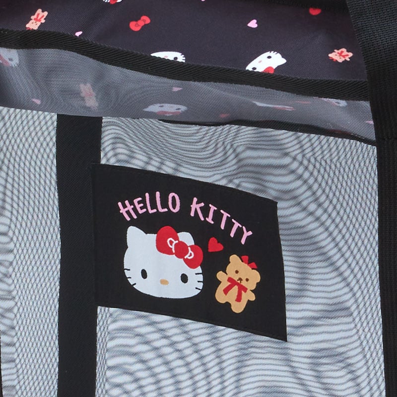 Hello Kitty mesh tote bag with plush toys inside, showcasing its versatility