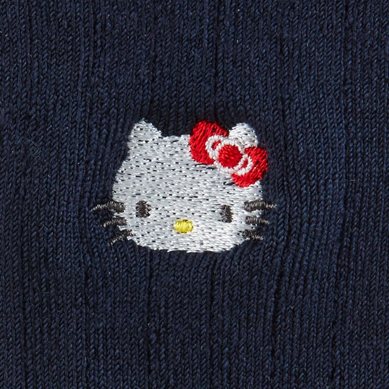 Close-up of embroidered Hello Kitty face on crew socks