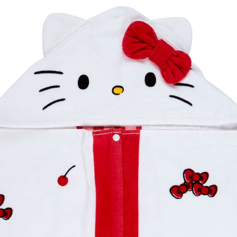 Front view of a plush hooded bath towel with all-over Hello Kitty print and cherry accents