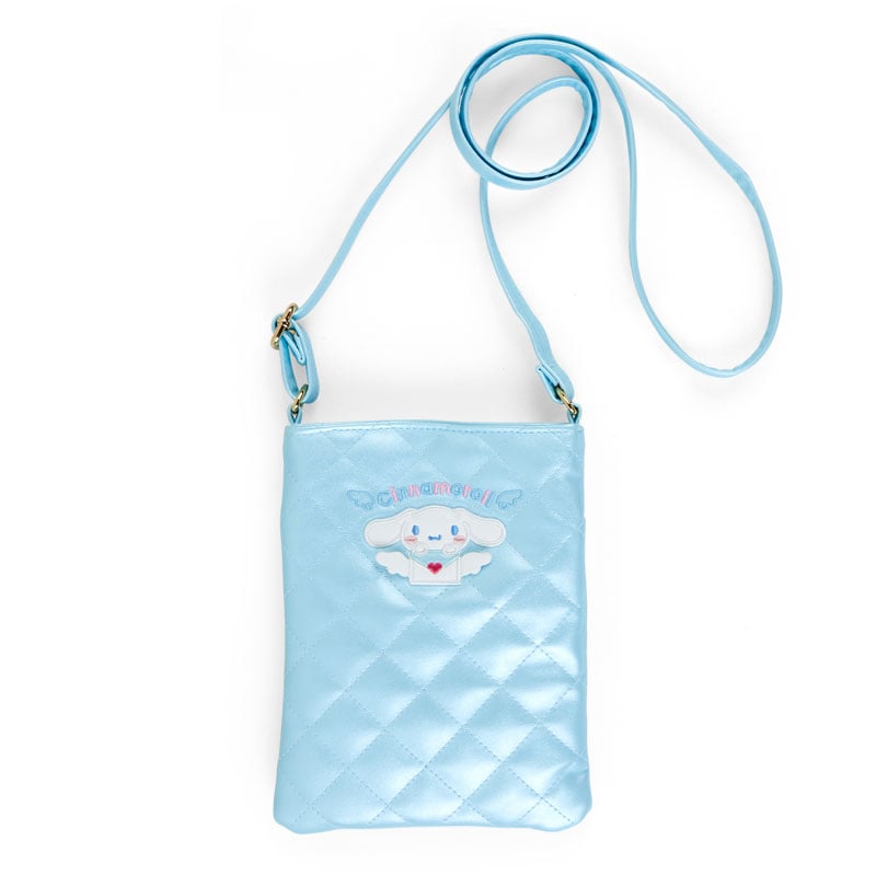Side view of the Cinnamoroll bag showcasing its quilted design and pastel colors.
