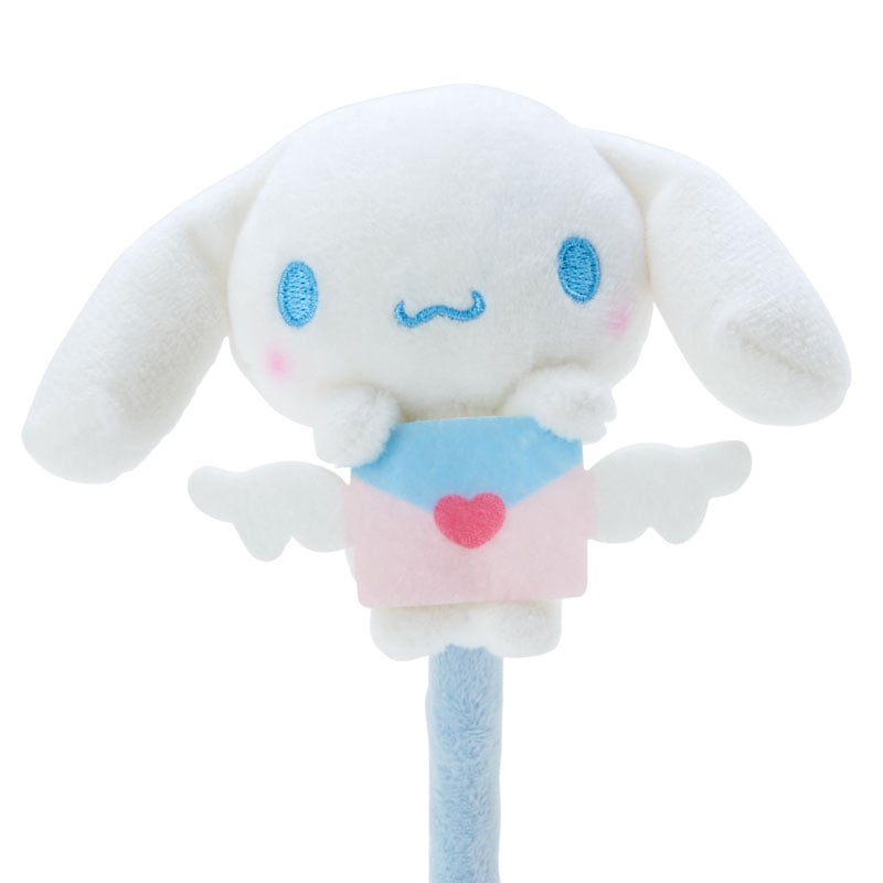 Cinnamoroll pen used for journaling, with a notebook and coffee cup nearby