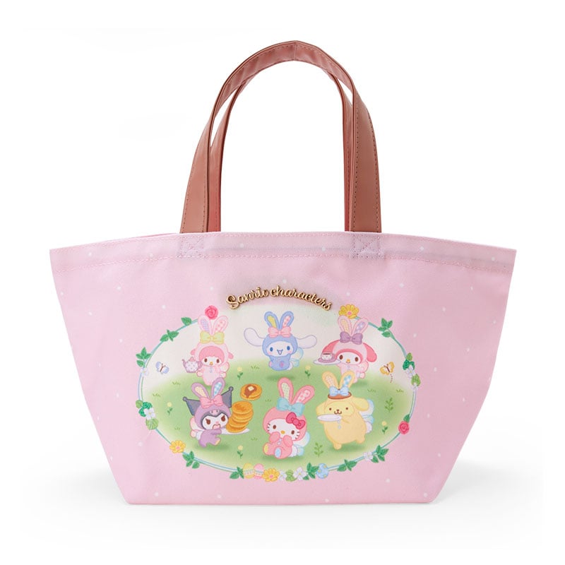 Close-up of Sanrio characters tote bag showing bunny costumes and front plate detail