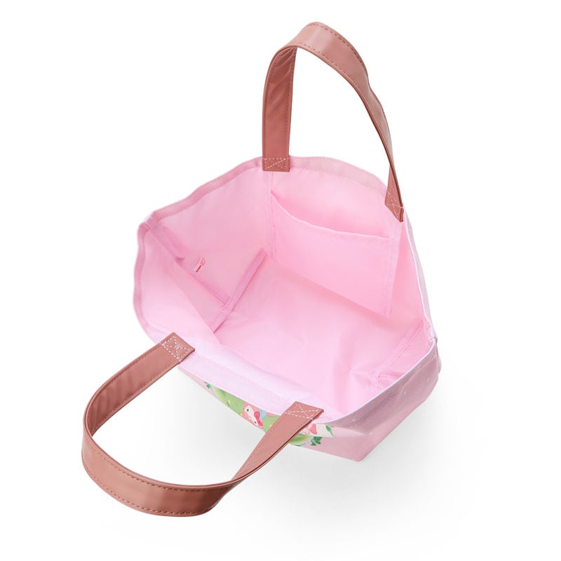 Interior view of the tote bag with pink lining and internal pocket