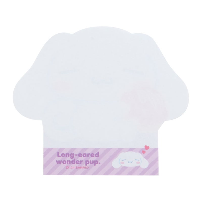 Close-up of die-cut memo pad sheets with cute expressions