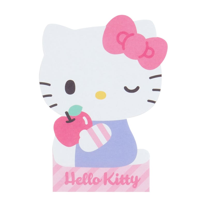 Close-up of Sanrio stationery featuring colorful die-cut memo pads.