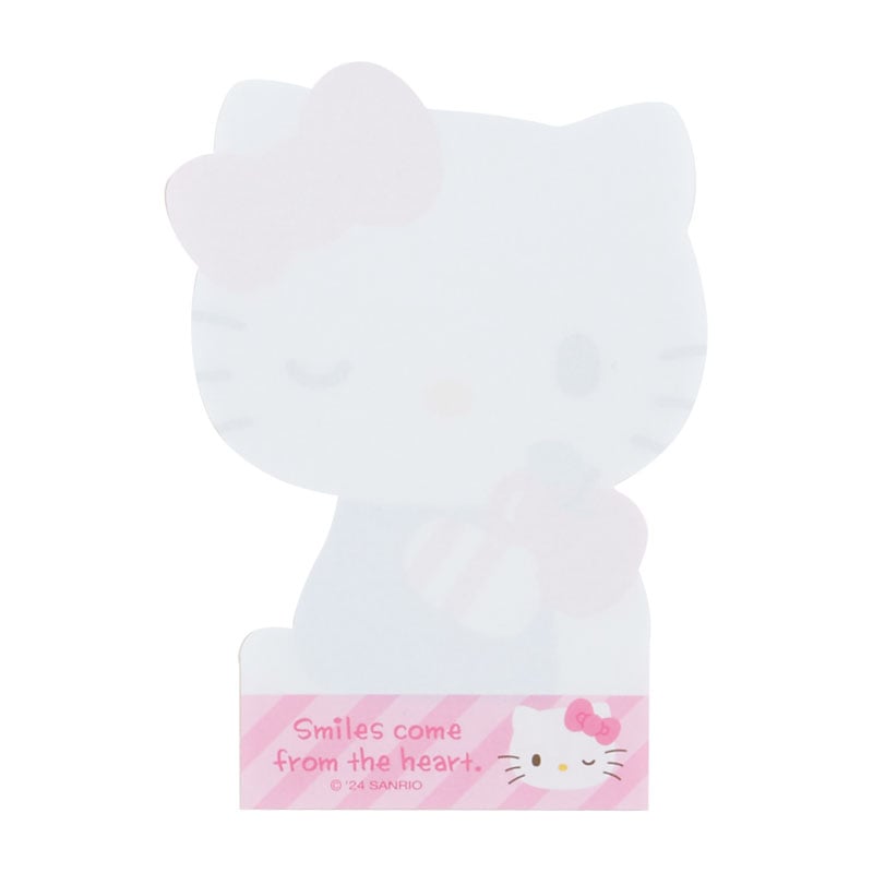 Close-up of Sanrio stationery featuring colorful die-cut memo pads.