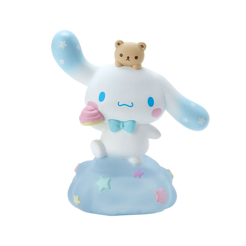 Cinnamoroll mini figurine in decorative box on a bookshelf