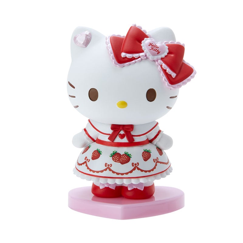 Close-up of boxed hello kitty figurines arranged neatly for display