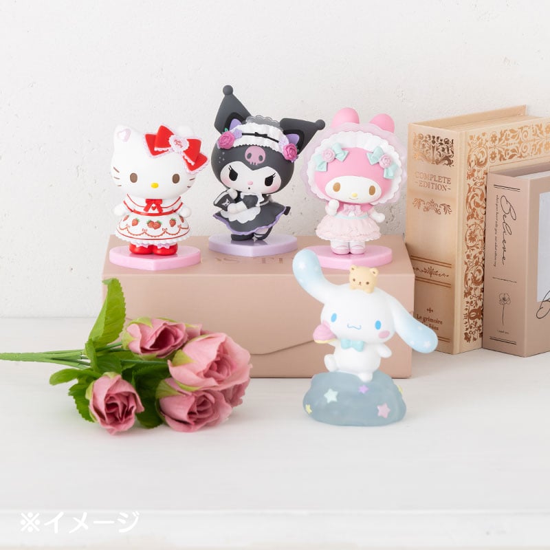 Kuromi mini figurine in decorative box on a desk