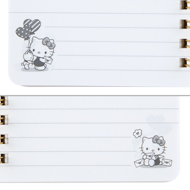 Closeup of spiral binding and ruled pages from the Hello Kitty notebook