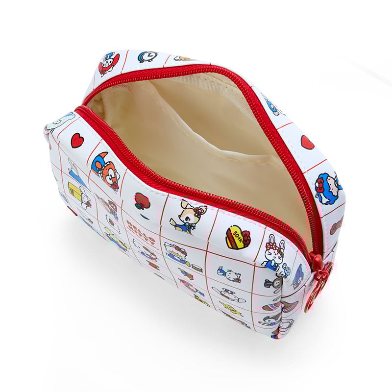 Close-up of Hello Kitty mini zipper pouch with bow charm.