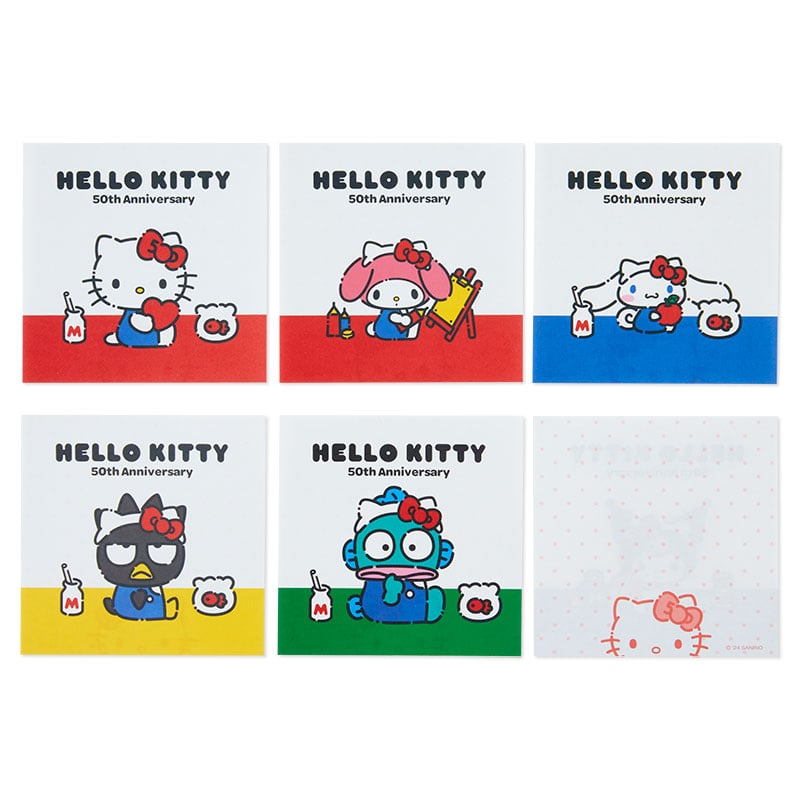Close-up of writing side showing Hello Kitty pattern on memo pad.