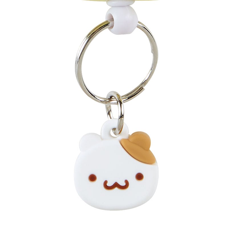 Front view of the Pompompurin badge reel with lobster clasp and keychain detail