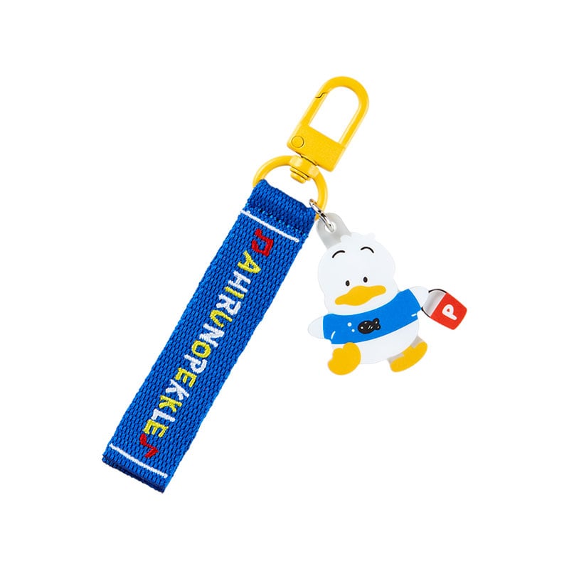 Front view of Pekkle plush hello kitty keychain attached to a canvas tote