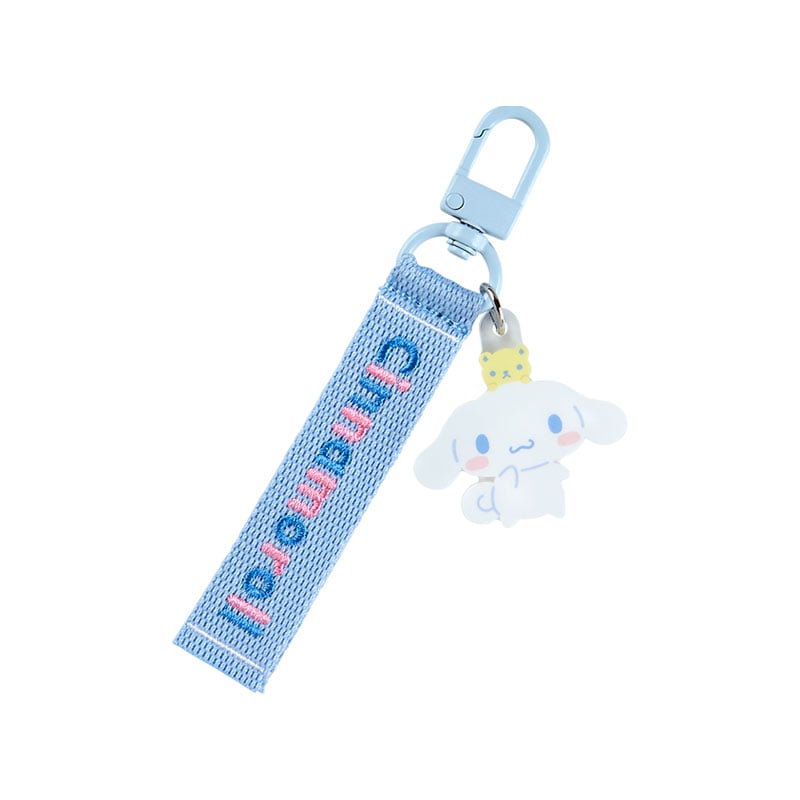 Cinnamoroll keychain displayed with keys against a pastel backdrop