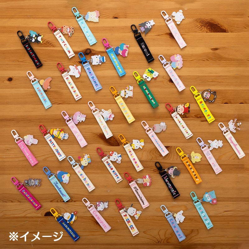 Close-up of the Retro Cinnamoroll plush keychain with Sanrio embroidery