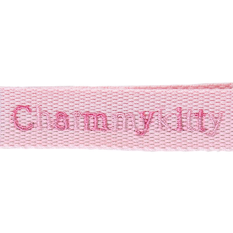Side view showing keychain clasp and tag details