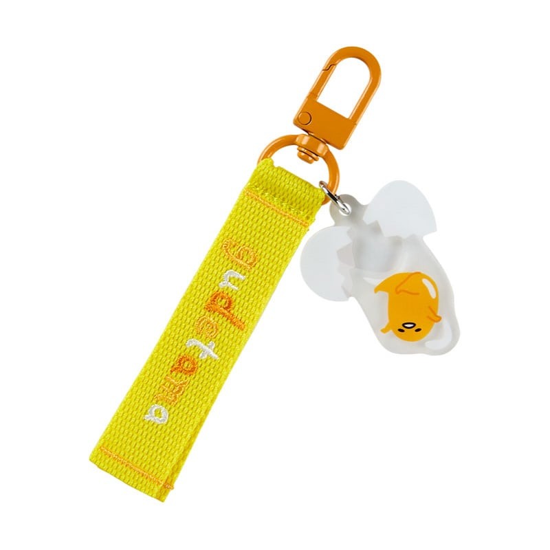 Close-up of the Gudetama keychain showcasing its cute design.