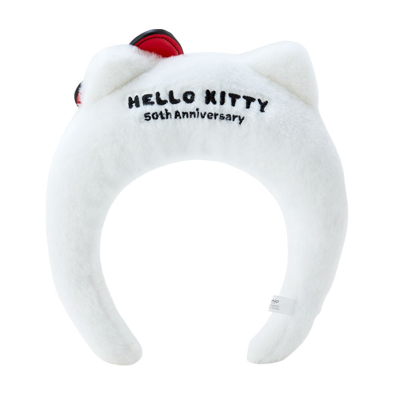 Close-up of the Hello Kitty 50th Anniversary logo on the headband