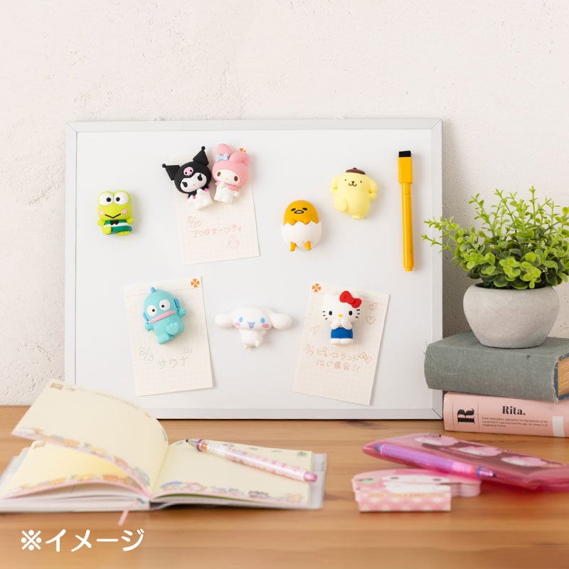 Sanrio Hello Kitty magnet displayed on an office desk.