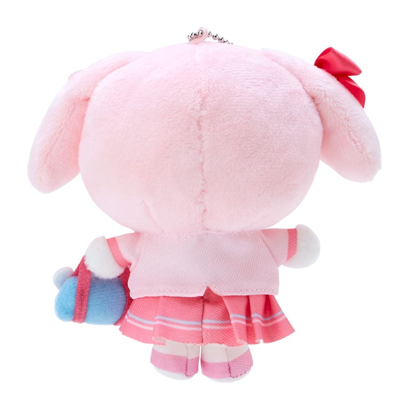 My Melody keychain displayed on a denim backpack strap