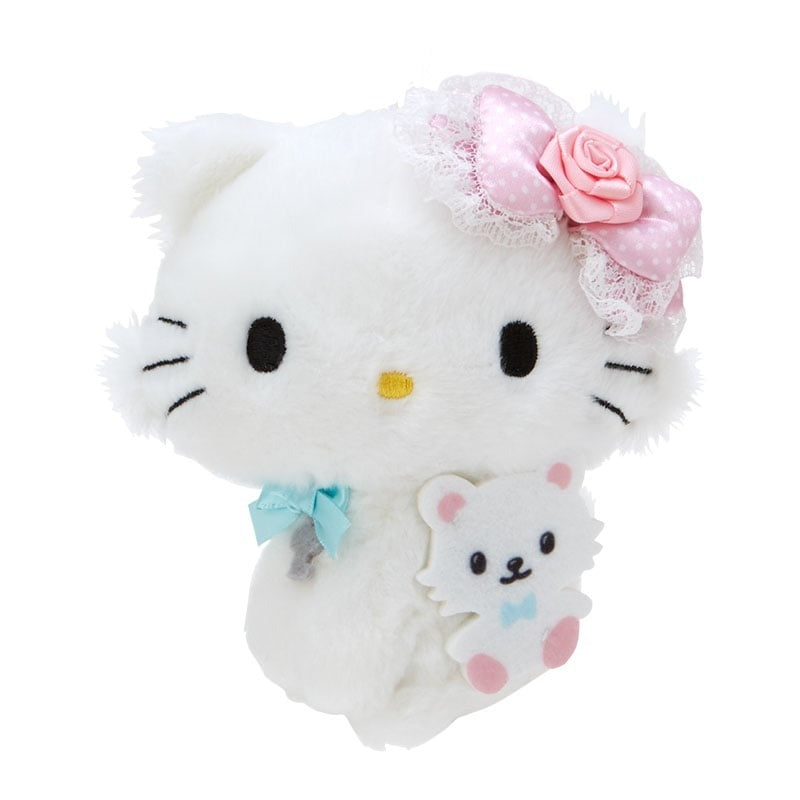 Miffy and Hello Kitty plush keychains attached to a tote bag