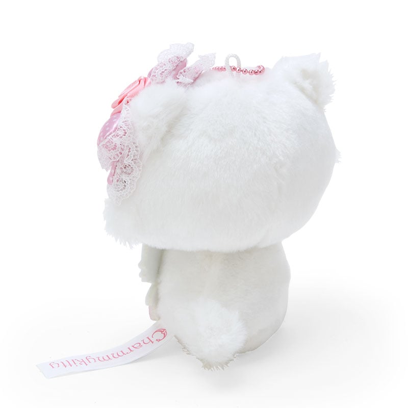 Sanrio Characters plush keychain being attached to a purse strap