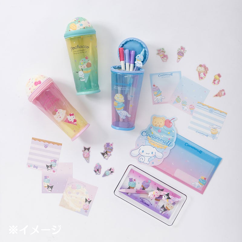 Cinnamoroll pencil pouch open on a notebook with pens inside