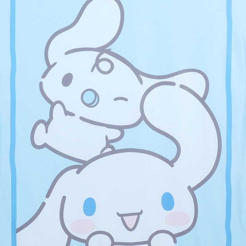 Cinnamoroll cooling blanket spread on a picnic table in the park