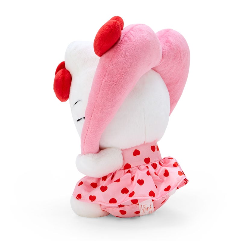 Side view of the 9" Hello Kitty plush showing embroidered details