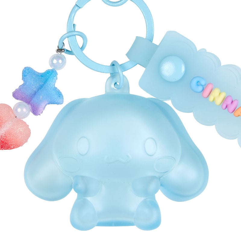 Cinnamroll Gummy Keychain attached to a backpack, demonstrating its use as a fun accessory.