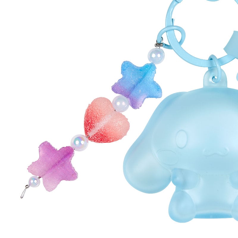 Cinnamroll Gummy Keychain side view, highlighting its transparent PVC material and push clasp closure.
