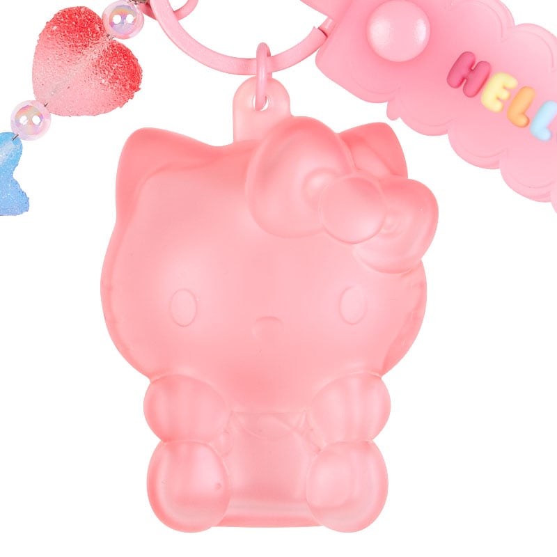 Showcasing the vibrant gummy candy colors of the Hello Kitty keychain.