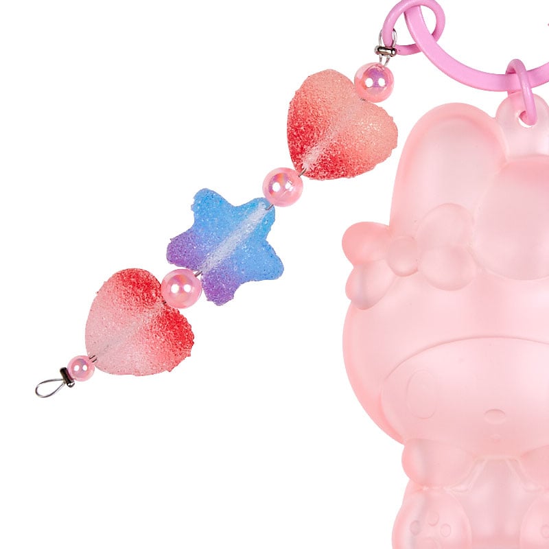 Sanrio blind box keychain displayed alongside other kawaii desk accessories