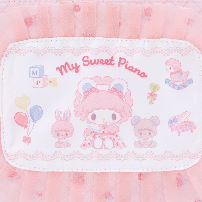 Size comparison showing pouch next to smartphone and lip balm