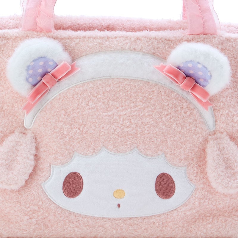 Interior of the My Sweet Piano plush handbag featuring printed lining and internal pockets.