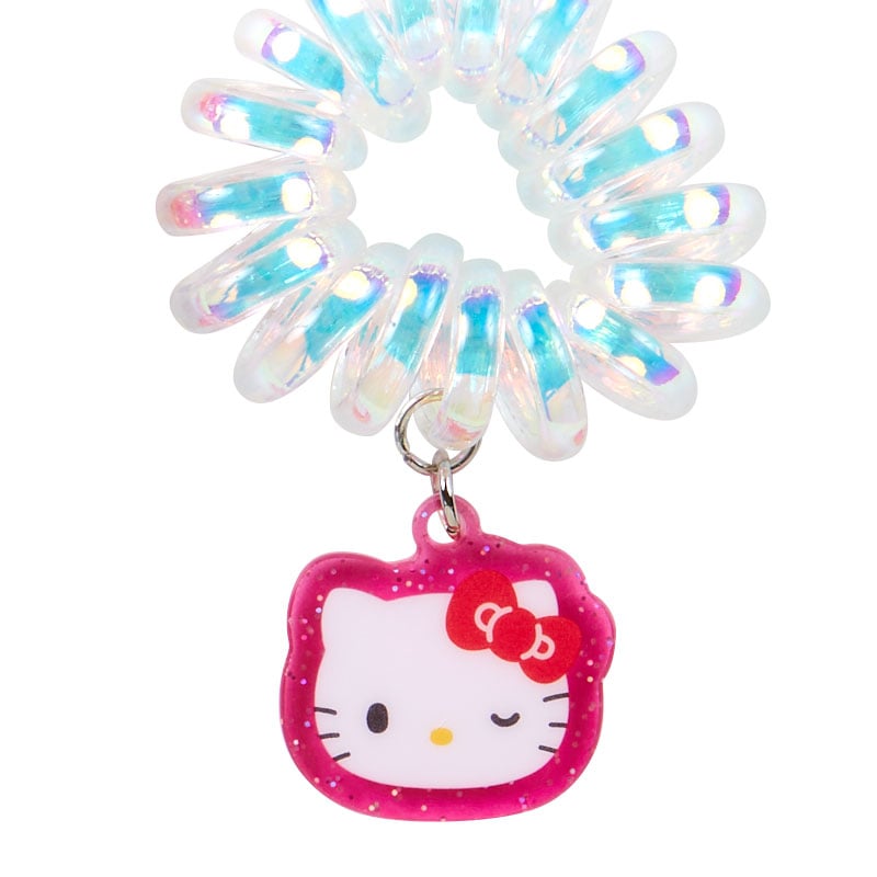 Set of two cute hair accessories with Hello Kitty charms on a white background