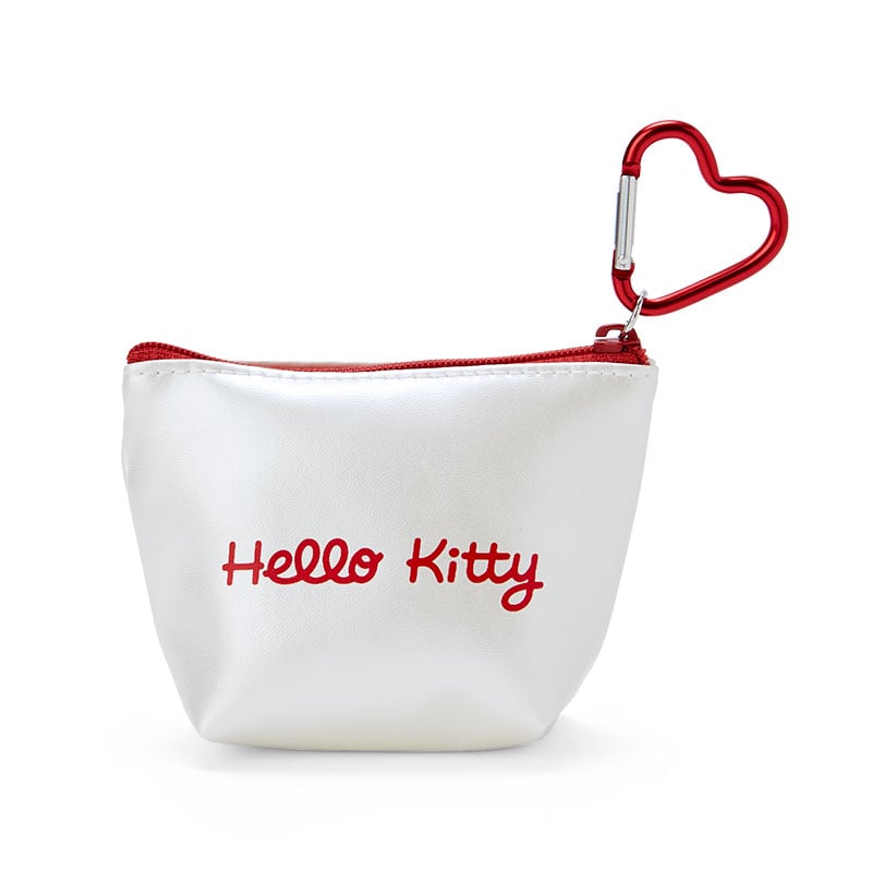 Hello Kitty zipper pouch being used as a travel accessory pouch