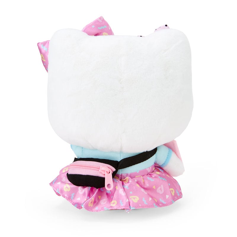 Size comparison of Hello Kitty plush next to a coffee mug