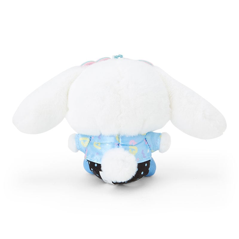 Cinnamoroll plush keychain hanging from a backpack zipper